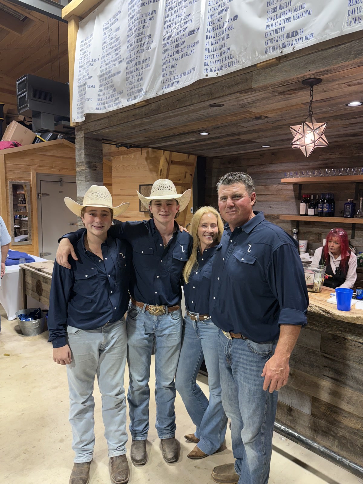 Team roping at the 7J Ranch arena in Bay City, Texas